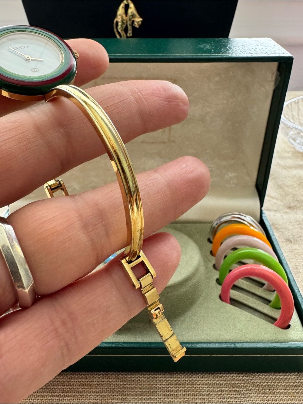 Gucci Gold Bangle Watch with Interchangeable Multicolor Bezels - Picture 15 of 16